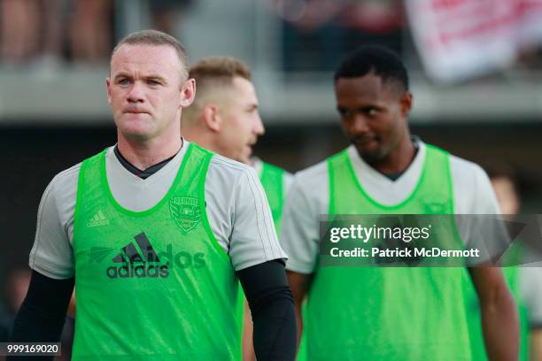 Wayne Rooney of DC United walks onto the field before playing against the Vancouver Whitecaps during his MLS debut at Audi Field on July 14, 2018 in...