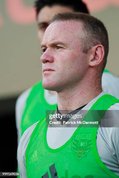 Wayne Rooney of DC United looks on before playing against the Vancouver Whitecaps during his MLS debut at Audi Field on July 14, 2018 in Washington,...