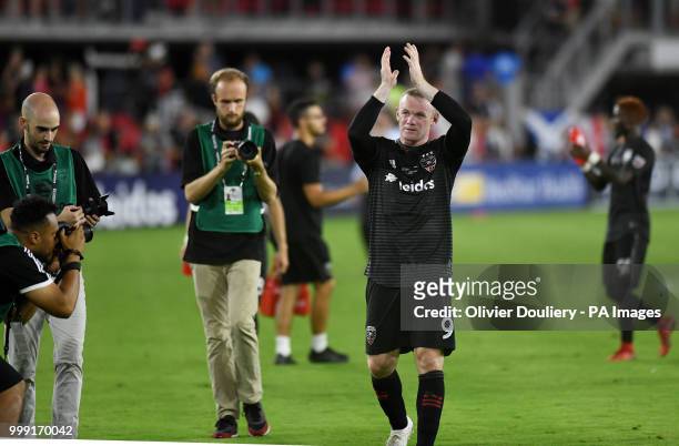 United player Wayne Rooney thanks the supporters after the Major League Soccer match between D.C. United and Vancouver Whitecaps FC at the Audi Field...