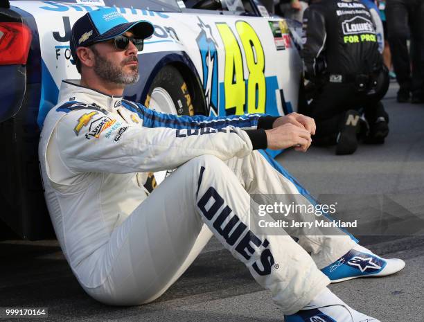 Jimmie Johnson, driver of the Lowe's/Jimmie Johnson Foundation Chevrolet, sits on the grid prior to the Monster Energy NASCAR Cup Series Quaker State...