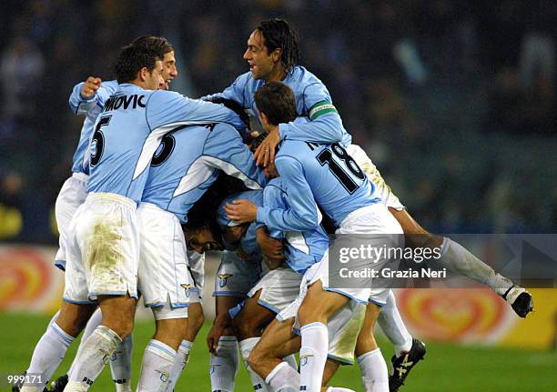 Fabio Liverani of Lazio celebrates with team mates after scoring during the Serie A 12th Round League match between Lazio and Juventus , played at...