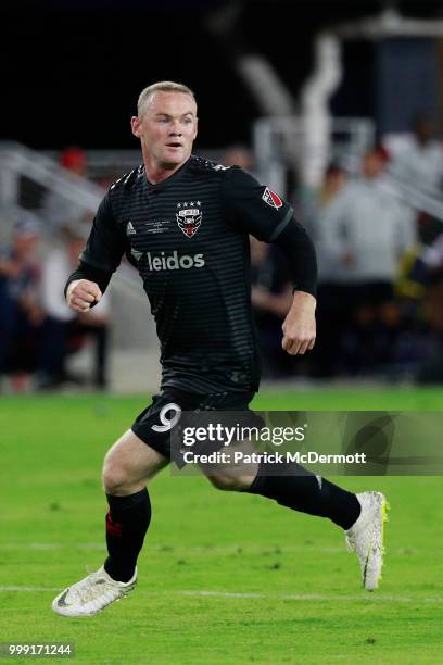 Wayne Rooney of D.C. United runs in the second half against the Vancouver Whitecaps during his MLS debut at Audi Field on July 14, 2018 in...