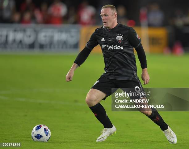 Wayne Rooney of DC United looks to pass during the DC United vs the Vancouver Whitecaps FC match in Washington DC on July 14, 2018.