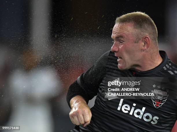 Wayne Rooney of DC United looks on after heading the ball during the DC United vs the Vancouver Whitecaps FC match in Washington DC on July 14, 2018.