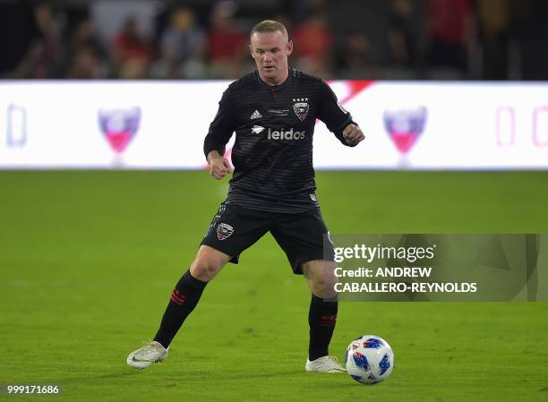 Wayne Rooney of DC United looks to pass during the DC United vs the Vancouver Whitecaps FC match in Washington DC on July 14, 2018.