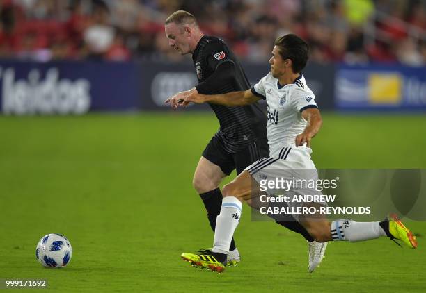 Wayne Rooney of DC United fights for the ball during the DC United vs the Vancouver Whitecaps FC match in Washington DC on July 14, 2018.