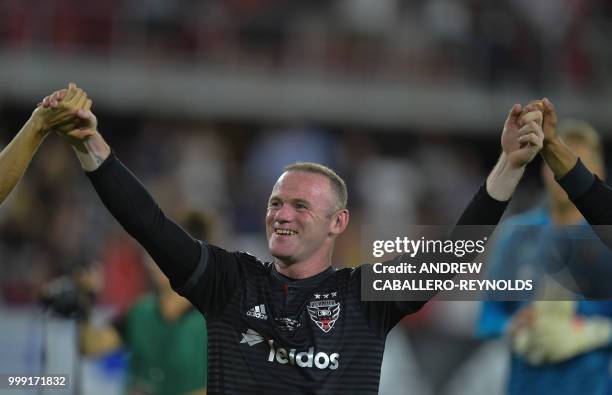 Wayne Rooney of DC United celebrates after the DC United vs the Vancouver Whitecaps FC match in Washington DC on July 14, 2018.