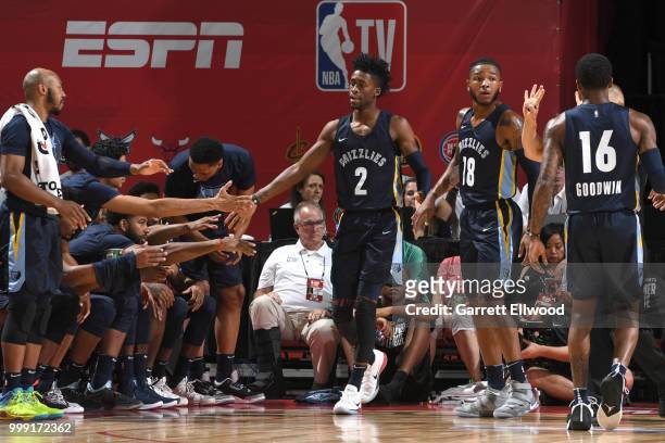Kobi Simmons of the Memphis Grizzlies high fives his teammates during the game against the Utah Jazz during the 2018 Las Vegas Summer League on July...