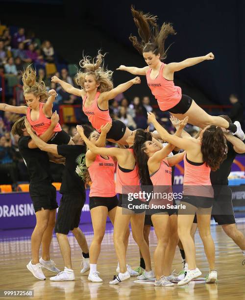 Dancers perform before the round 11 Super Netball match between the Firebirds and the Giants at Brisbane Entertainment Centre on July 15, 2018 in...