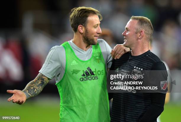 Wayne Rooney of DC United celebrates after the DC United vs the Vancouver Whitecaps FC match in Washington DC on July 14, 2018.