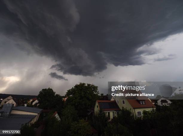 Dark thunder clouds can be seen above Ebing, Germany, 15 August 2017. Photo: Nicolas Armer/dpa