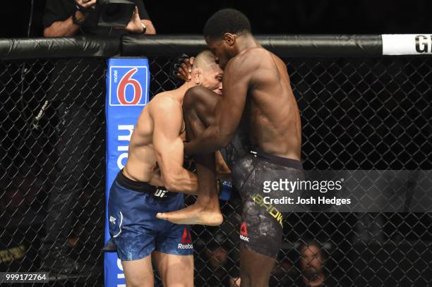 Randy Brown of Jamaica knees Niko Price in their welterweight fight during the UFC Fight Night event inside CenturyLink Arena on July 14, 2018 in...