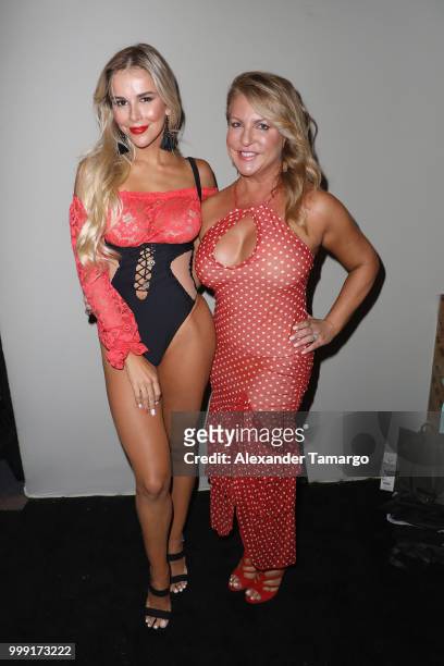 Agueda Lopez and Lourdes Hanimian pose backstage for Luli Fama during the Paraiso Fashion Fair at The Paraiso Tent on July 14, 2018 in Miami Beach,...