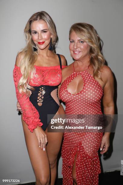 Agueda Lopez and Lourdes Hanimian pose backstage for Luli Fama during the Paraiso Fashion Fair at The Paraiso Tent on July 14, 2018 in Miami Beach,...