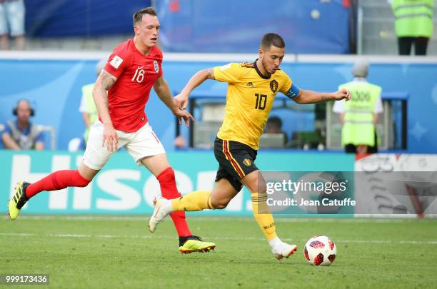 Eden Hazard of Belgium, followed by Phil Jones of England is about to score the second goal of Belgium during the 2018 FIFA World Cup Russia 3rd...