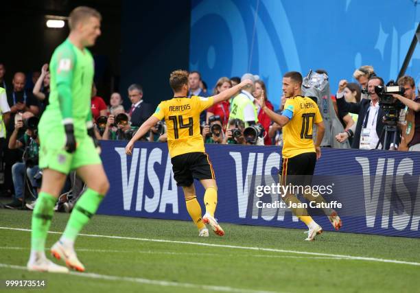 Eden Hazard of Belgium celebrates his goal with Dries Mertens while goalkeeper of England Jordan Pickford looks on during the 2018 FIFA World Cup...