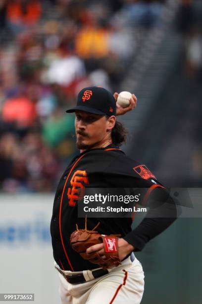 Jeff Samardzija of the San Francisco Giants delivers a pitch during the first inning against the Oakland Athletics at AT&T Park on July 14, 2018 in...
