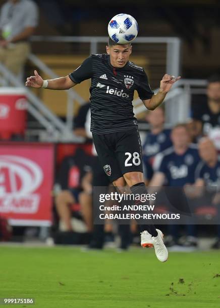 Joseph Mora of DC United heads the ball during the DC United vs the Vancouver Whitecaps FC match in Washington DC on July 14, 2018.