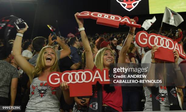 Fans celebrate during the DC United vs the Vancouver Whitecaps FC match in Washington DC on July 14, 2018.