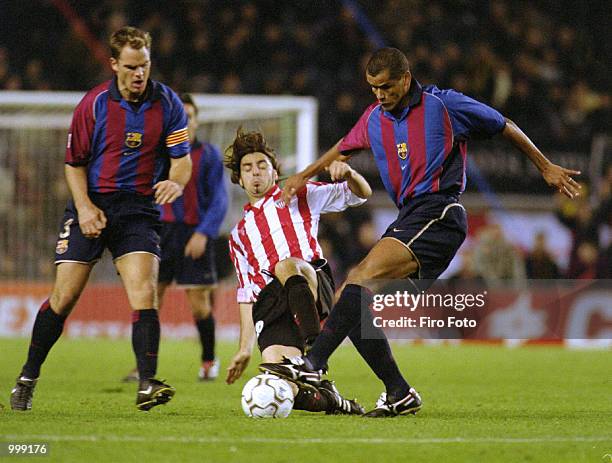 Rivaldo of Barcelona and Alkiza of Athletic Bilbao and Frank De Boer of Barcelona in action during the Spanish Primera League match played between...