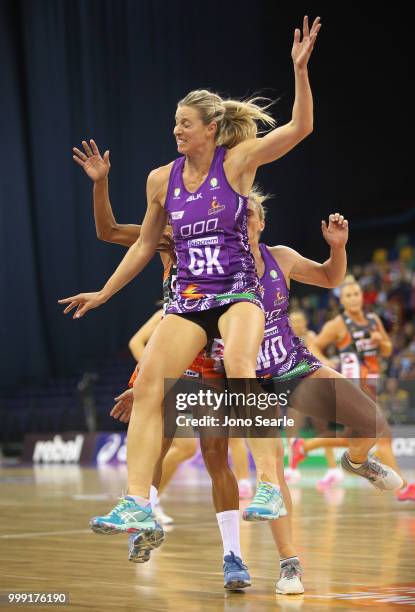 Laura Geitz of the Firebirds collides with a Giants player during the round 11 Super Netball match between the Firebirds and the Giants at Brisbane...