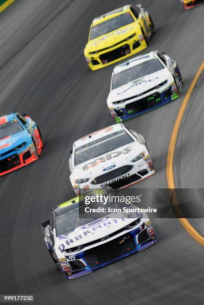 Kasey Kahne Leavine Family Racing Chevrolet Camaro ZL1 leads a pack of cars through turn one during the Monster Energy NASCAR Cup Series Quaker State...