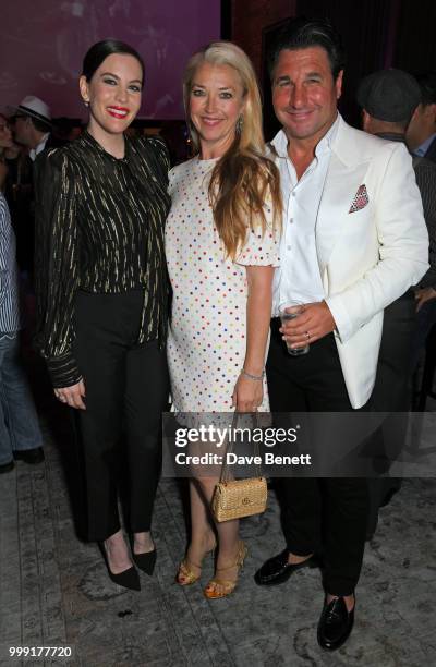 Liv Tyler, Tamara Beckwith and Giorgio Veroni attend the Formula E 1920's cocktail party hosted by Liv Tyler on the eve of the final race of the...