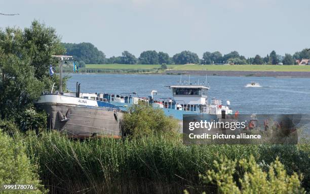 The tanker Alina lies stranded on a bank after running aground near Hamburg, Germany, 16 August 2017. The ship's crew and tanks escaped the incident...