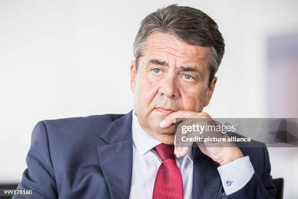 German foreign minister Sigmar Gabriel poses for a portrait after an interview in Berlin, Germany, 16 August 2017. Photo: Michael Kappeler/dpa