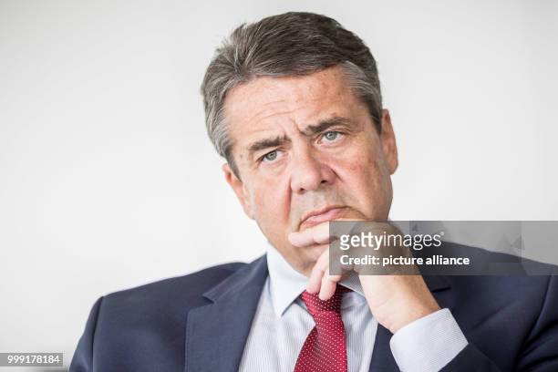 German foreign minister Sigmar Gabriel poses for a portrait after an interview in Berlin, Germany, 16 August 2017. Photo: Michael Kappeler/dpa