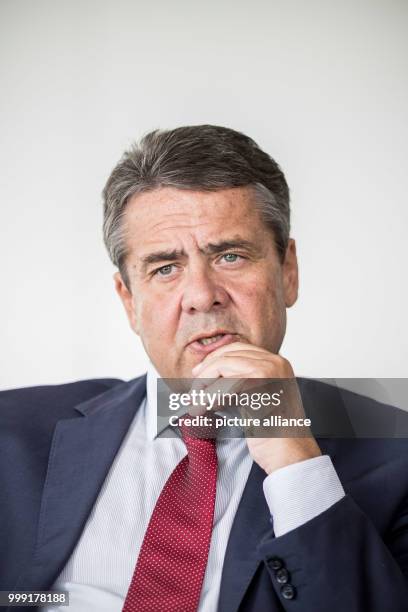 German foreign minister Sigmar Gabriel poses for a portrait after an interview in Berlin, Germany, 16 August 2017. Photo: Michael Kappeler/dpa