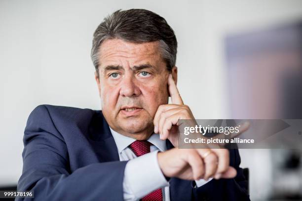 German foreign minister Sigmar Gabriel poses for a portrait after an interview in Berlin, Germany, 16 August 2017. Photo: Michael Kappeler/dpa