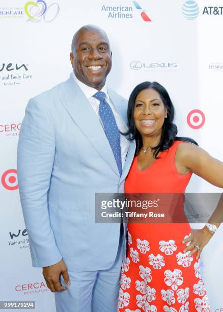 Magic Johnson and Cookie Johnson attend the HollyRod 20th Annual DesignCare at Cross Creek Farm on July 14, 2018 in Malibu, California.