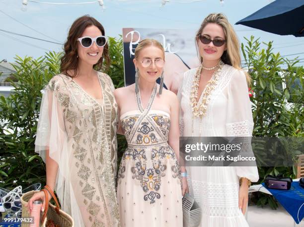 Toby Milstein, Sydney Sadick and Beach Magazine Editor-in-Chief Sarah Bray attend the Modern Luxury + The Next Wave at Breakers Montauk on July 14,...