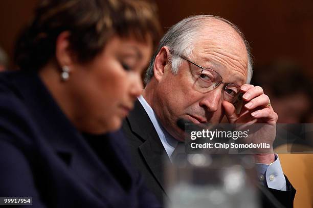 Secretary of the Interior Ken Salazar listens to Environmental Protection Agency Administrator Lisa Jackson testify about the government response to...