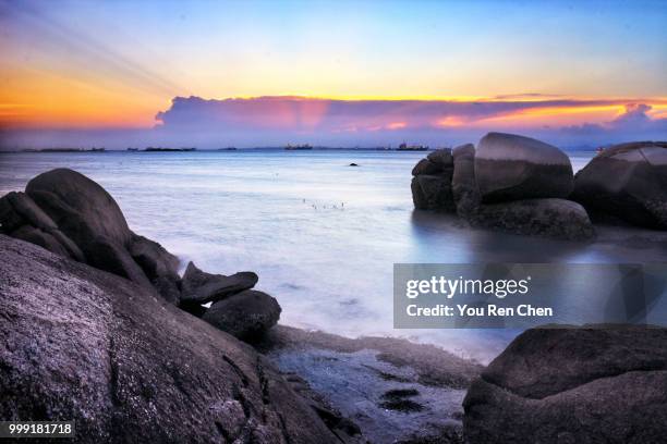 kinmen beach sunset - ren stock pictures, royalty-free photos & images