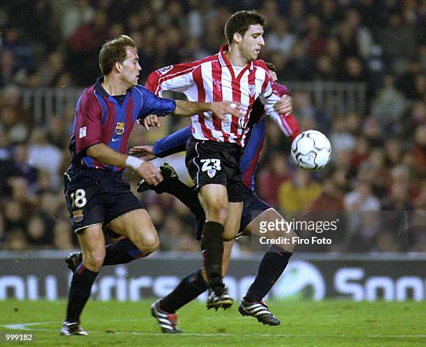 Tiko of Athletic Bilbao and Gabri and Xavi both of Barcelona in action during the Spanish Primera League match played between Barcelona and Athletic...