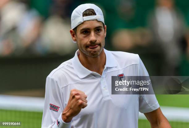John Isner of the United States celebrates against Kevin Anderson of South Africa in the semi final of the gentlemen's singles at the All England...