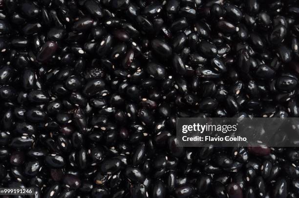 black beans for brazilian feijoada - flavio coelho stock pictures, royalty-free photos & images