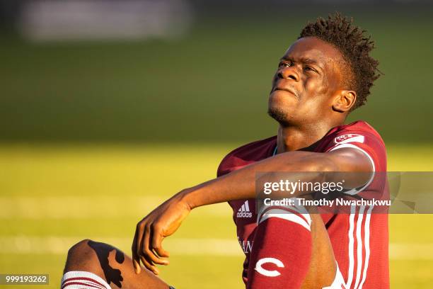 Dominique Badji of Colorado Rapids catches his breath against the Houston Dynamo at Dick's Sporting Goods Park on July 14, 2018 in Commerce City,...