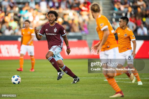 Giles Barnes of Colorado Rapids dribbles against the Houston Dynamo at Dick's Sporting Goods Park on July 14, 2018 in Commerce City, Colorado.