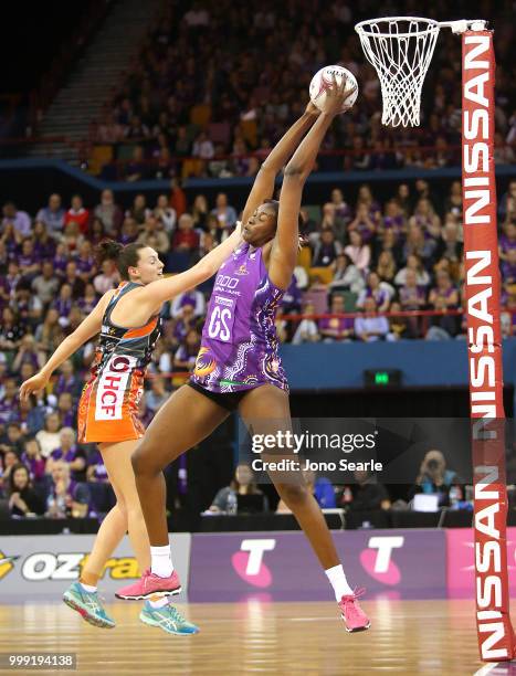 Romelda Aiken of the Firebirds catches the ball during the round 11 Super Netball match between the Firebirds and the Giants at Brisbane...