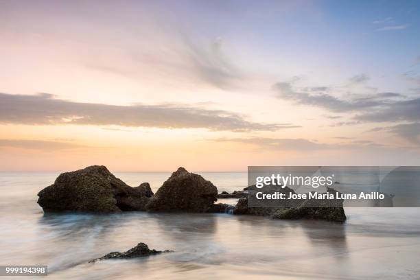 simple seascape - anillo stock pictures, royalty-free photos & images