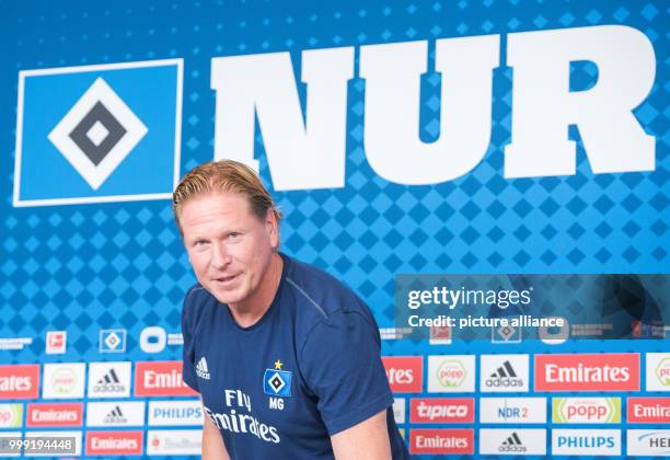 Markus Gisdol, coach of the soccer club Hamburger SV is speaking at a press conference ahead of the start of the new bundesliga season in Hamburg,...