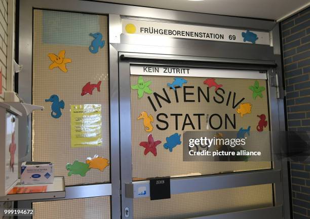 The entrance to Intensive Care Unit 69 , at the children's clinic of Hannover Medical School in Hanover, Germany, 11 August 2017. Between 500 and 600...