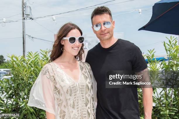 Toby Milstein and BCBG Designer Bernd Kroeber attend the Modern Luxury + The Next Wave at Breakers Montauk on July 14, 2018 in Montauk, New York.