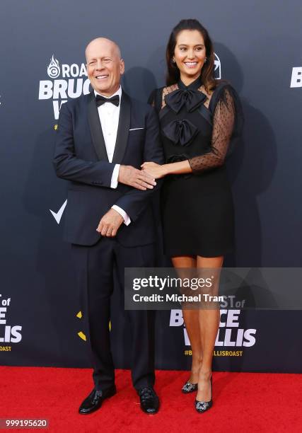 Bruce Willis and Emma Heming arrive to the Comedy Central "Roast of Bruce Willis" held on July 14, 2018 in Los Angeles, California.