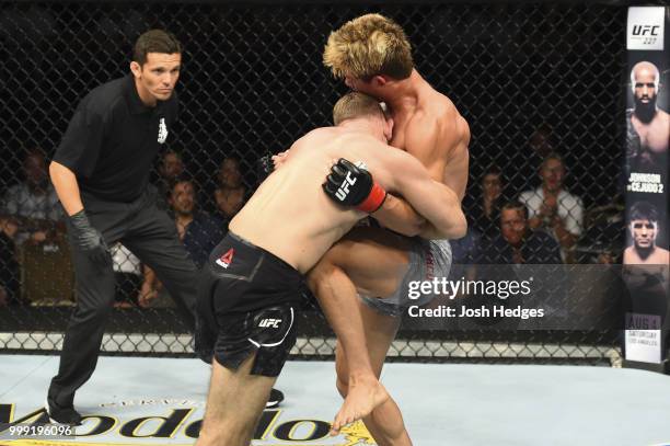 Zak Ottow attempts to takedown Sage Northcutt in their welterweight fight during the UFC Fight Night event inside CenturyLink Arena on July 14, 2018...