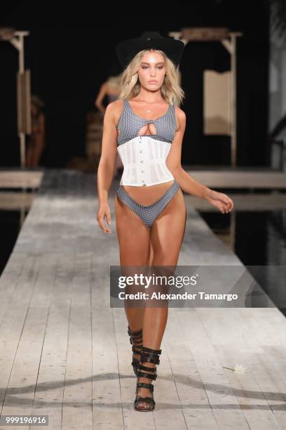 Model walks the runway for KHAOS WANTED 2019 Colelction during the Paraiso Fashion Fair at The Setai Miami Beach on July 14, 2018 in Miami Beach,...