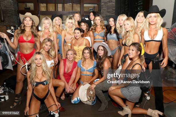 Models pose backstage for Kaohs during the Paraiso Fashion Fair at The Setai Miami Beach on July 14, 2018 in Miami Beach, Florida.